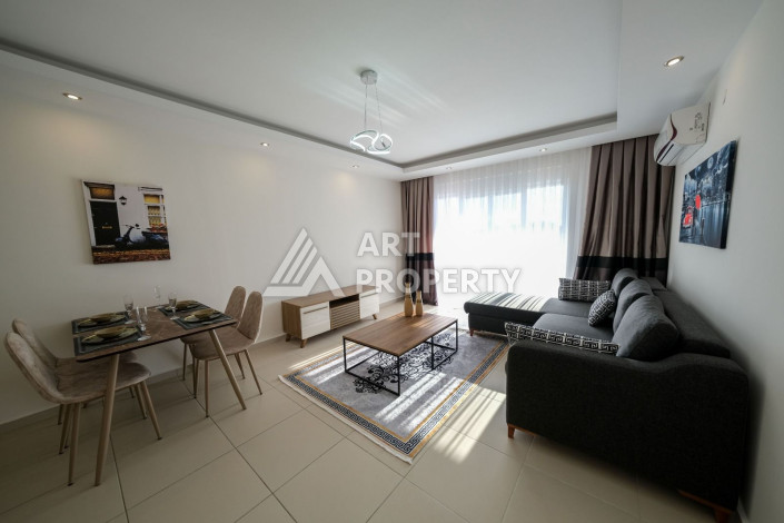 Меблированная квартира 1+1 хорошо подходит для жизни и отдыха в Махмутлар - Ракурс 2