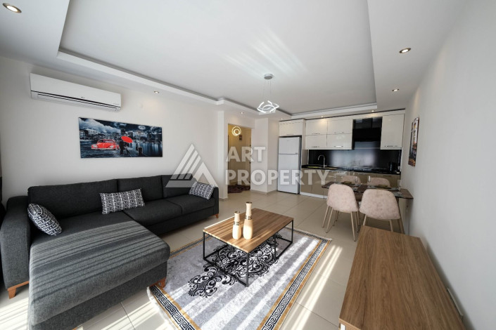 Меблированная квартира 1+1 хорошо подходит для жизни и отдыха в Махмутлар - Ракурс 4