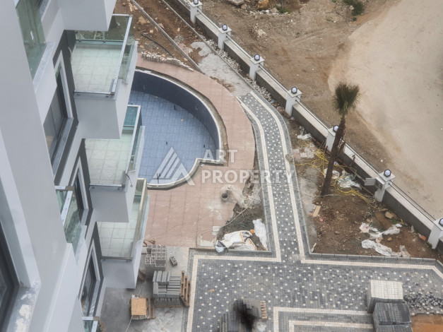 новая квартира 1+1 в красивом комплексе Махмутлар с прекрасным видом - Ракурс 12