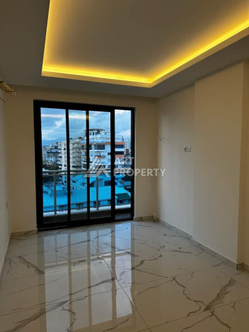 Квартиры 1+1 от инвестора в одном из лучших комплексов Махмутлара! - Ракурс 8