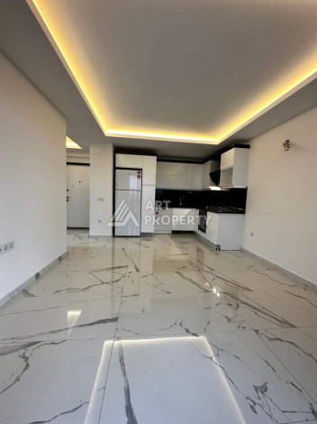 Квартиры 1+1 от инвестора в одном из лучших комплексов Махмутлара! - Ракурс 12