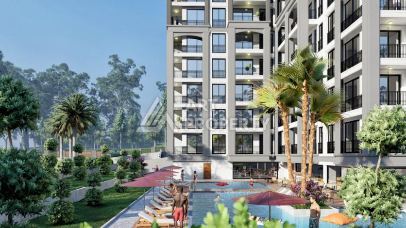 Проект на этапе строительства в Авсалларе! Выгодные инвестиции! - Ракурс 7