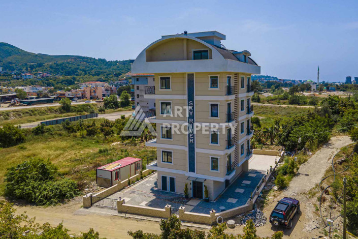 Квартира 1+1 в новом стильном доме района Демирташ - Ракурс 3