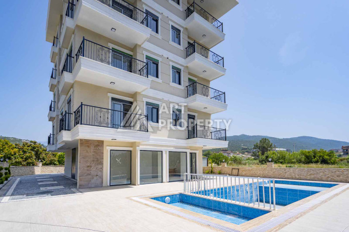 Квартира 1+1 в новом стильном доме района Демирташ - Ракурс 7