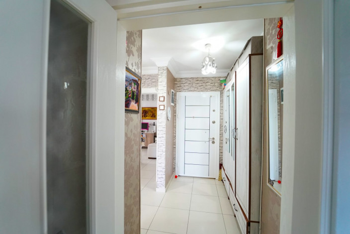 Меблированная трехкомнатная квартира с инфраструктурой в районе Махмутлар, 115 м2 - Ракурс 17