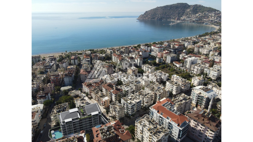 Новый инвестиционных проект в центре Алании, в 250м от пляжа Кейкубат - Ракурс 7
