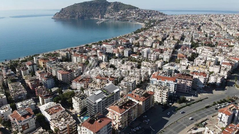 Новый инвестиционных проект в центре Алании, в 250м от пляжа Кейкубат - Ракурс 8