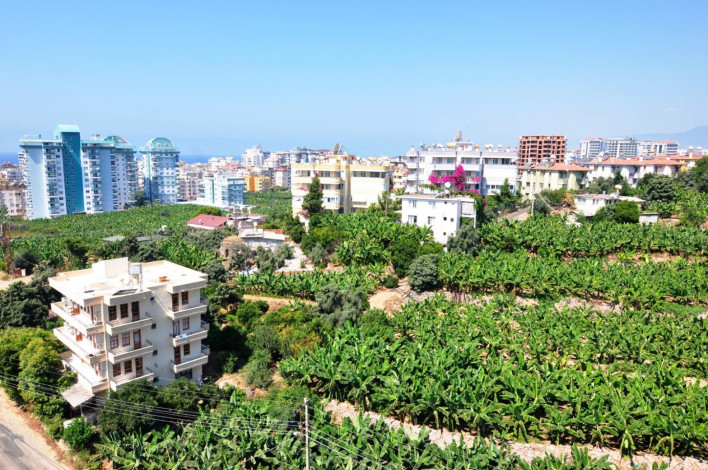 Две двухкомнатные квартиры вблизи Средиземного моря в Махмутлар, 70 м2 - Ракурс 13