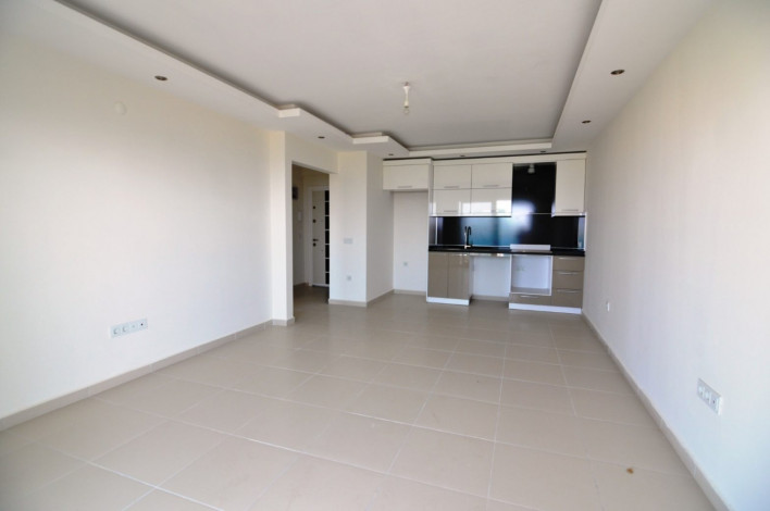 Две двухкомнатные квартиры вблизи Средиземного моря в Махмутлар, 70 м2 - Ракурс 16