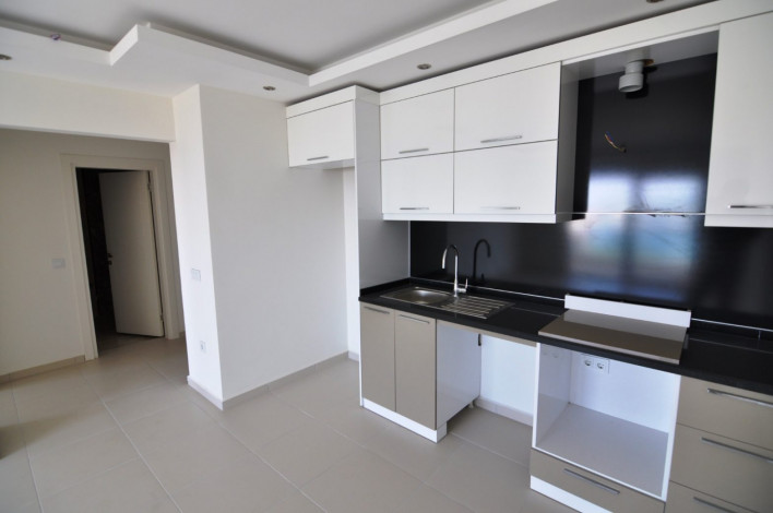 Две двухкомнатные квартиры вблизи Средиземного моря в Махмутлар, 70 м2 - Ракурс 18