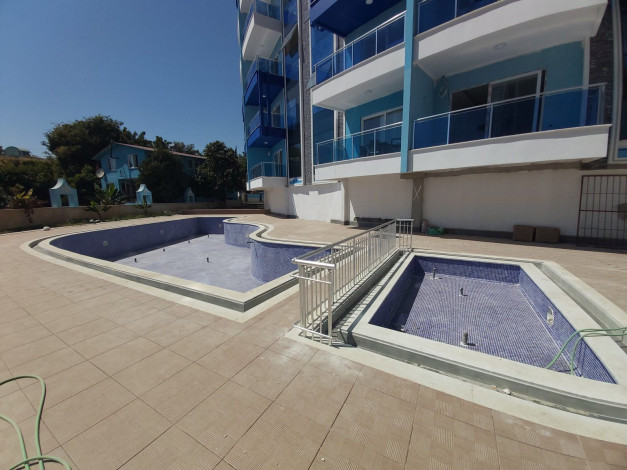 Две двухкомнатные квартиры в 450 метрах от Средиземного моря в районе Махмутлар, 55 м2 - Ракурс 6