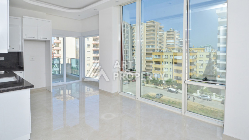 Светлые апартаменты 1+1 в премиальном комплексе района Махмутлар - Ракурс 10