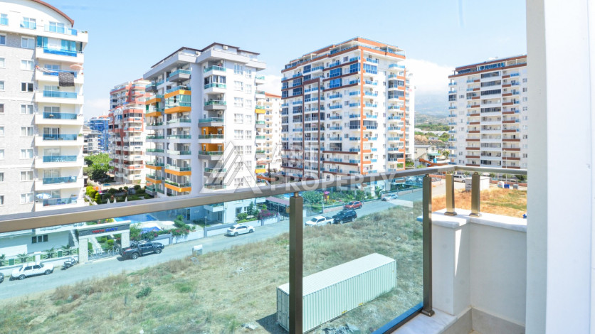 Светлые апартаменты 1+1 в премиальном комплексе района Махмутлар - Ракурс 15