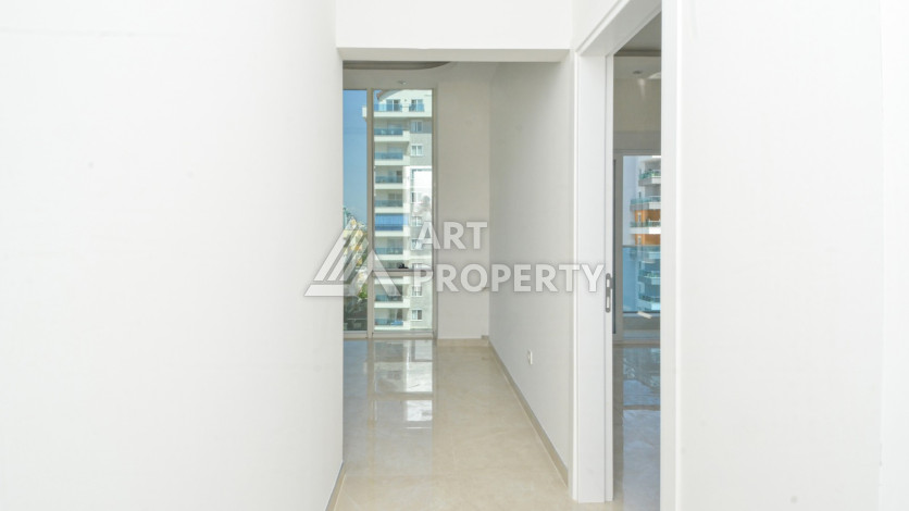 Светлые апартаменты 1+1 в премиальном комплексе района Махмутлар - Ракурс 16