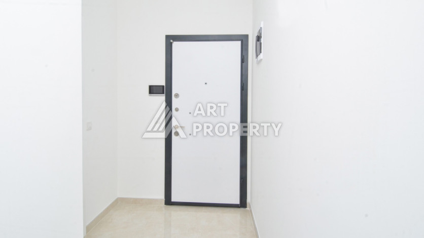 Светлые апартаменты 1+1 в премиальном комплексе района Махмутлар - Ракурс 17