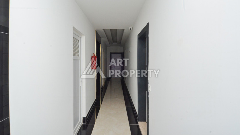 Светлые апартаменты 1+1 в премиальном комплексе района Махмутлар - Ракурс 21