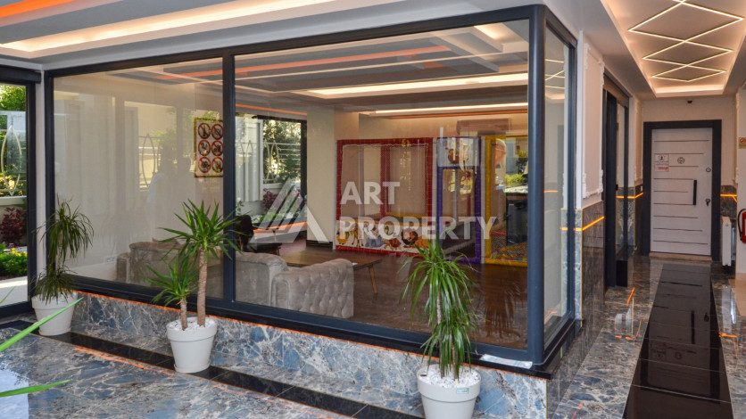 Светлые апартаменты 1+1 в премиальном комплексе района Махмутлар - Ракурс 25