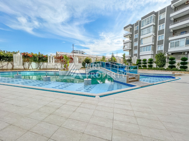 Апартаменты 1+1 в комплексе с полной инфраструктурой в районе Махмутлар - Ракурс 4