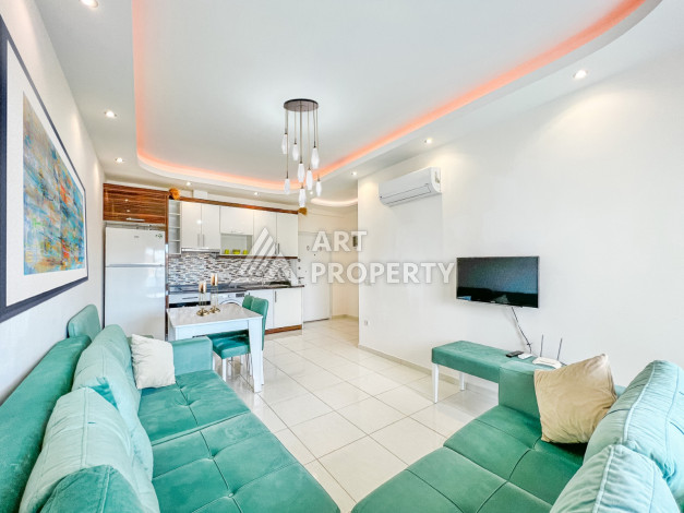 Апартаменты 1+1 в комплексе с полной инфраструктурой в районе Махмутлар - Ракурс 6