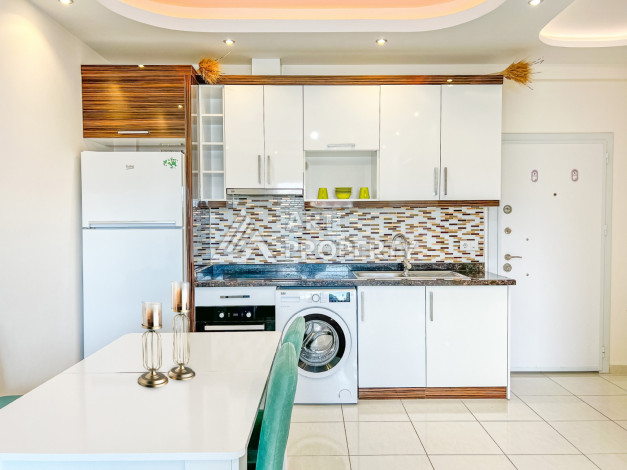 Апартаменты 1+1 в комплексе с полной инфраструктурой в районе Махмутлар - Ракурс 9