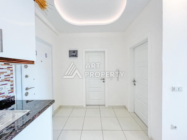 Апартаменты 1+1 в комплексе с полной инфраструктурой в районе Махмутлар - Ракурс 18