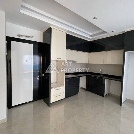 Квартира 1+1 в комплексе с премиальной инфраструктурой в районе Махмутлар - Ракурс 2