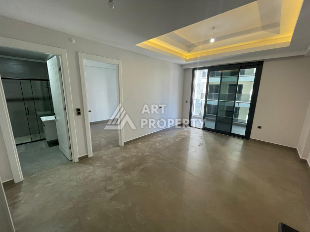 Качественные апартаменты 1+1 в стильном проекте района Махмутлар - Ракурс 9