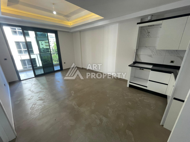 Качественные апартаменты 1+1 в стильном проекте района Махмутлар - Ракурс 10