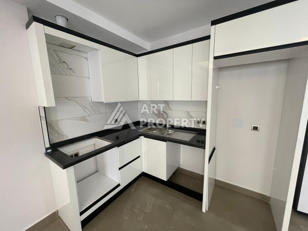 Качественные апартаменты 1+1 в стильном проекте района Махмутлар - Ракурс 11