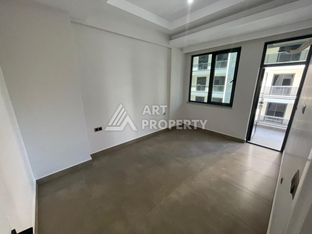 Качественные апартаменты 1+1 в стильном проекте района Махмутлар - Ракурс 12