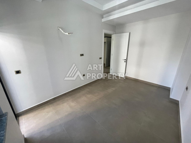 Качественные апартаменты 1+1 в стильном проекте района Махмутлар - Ракурс 14