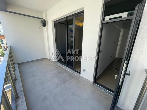 Качественные апартаменты 1+1 в стильном проекте района Махмутлар - Ракурс 17