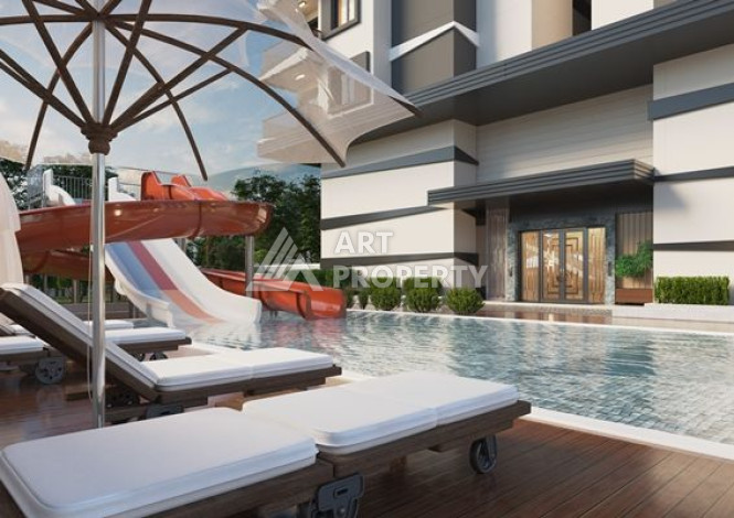 Качественные апартаменты 1+1 в стильном проекте района Махмутлар - Ракурс 20