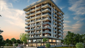Качественные апартаменты 1+1 в стильном новом комплексе района Махмутлар - Ракурс 1