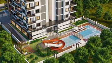 Качественные апартаменты 1+1 в стильном новом комплексе района Махмутлар - Ракурс 5