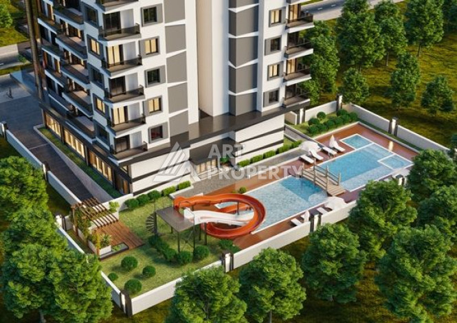 Качественные апартаменты 1+1 в стильном новом комплексе района Махмутлар - Ракурс 4