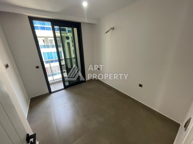 Качественные апартаменты 1+1 в стильном новом комплексе района Махмутлар - Ракурс 6