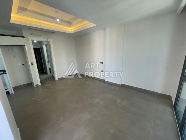 Качественные апартаменты 1+1 в стильном новом комплексе района Махмутлар - Ракурс 9