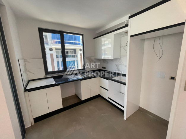 Качественные апартаменты 1+1 в стильном новом комплексе района Махмутлар - Ракурс 10