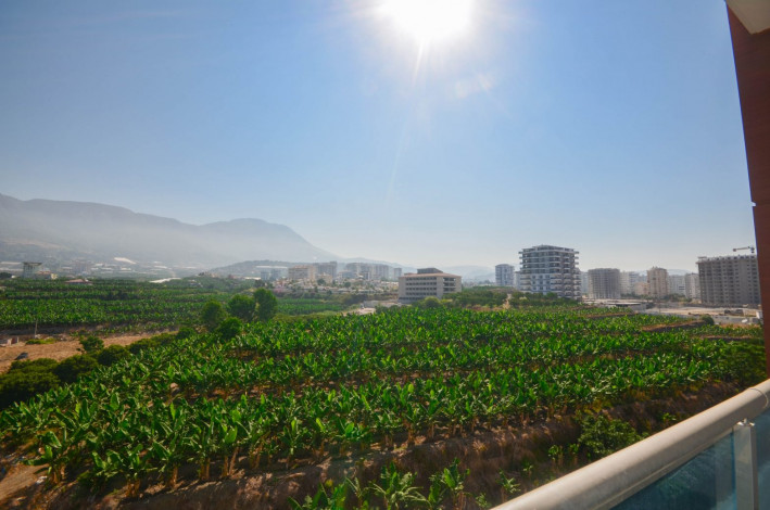 Квартира 1+1 в центральной части Махмутлара в одном из лучших комплексов района, 65 м2 - Ракурс 17