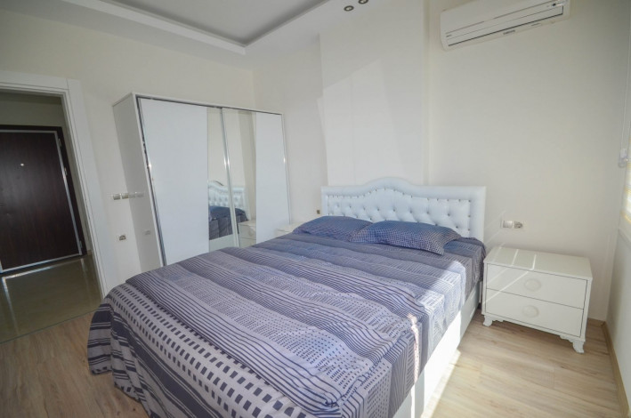 Квартира 1+1 в центральной части Махмутлара в одном из лучших комплексов района, 65 м2 - Ракурс 20