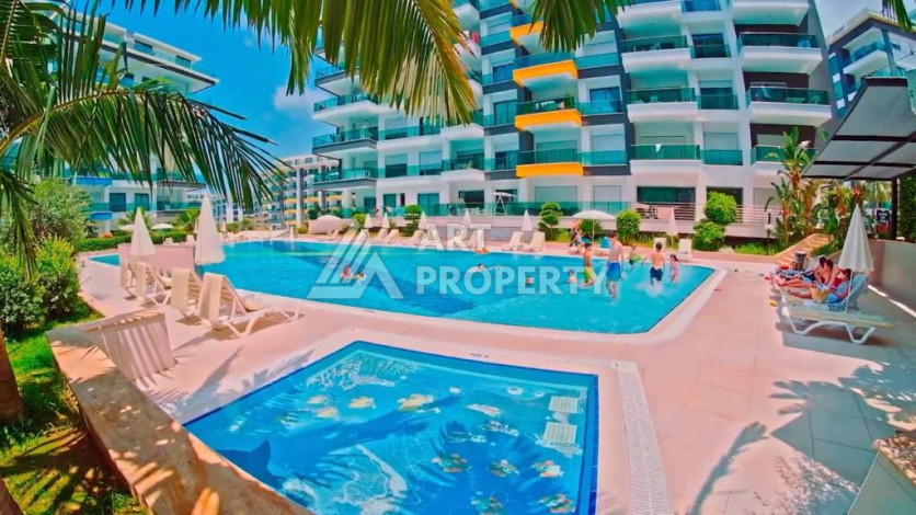 Меблированная квартира 1+1 от топового застройщика с полной инфраструктурой на берегу моря район Каргыджак - Ракурс 14