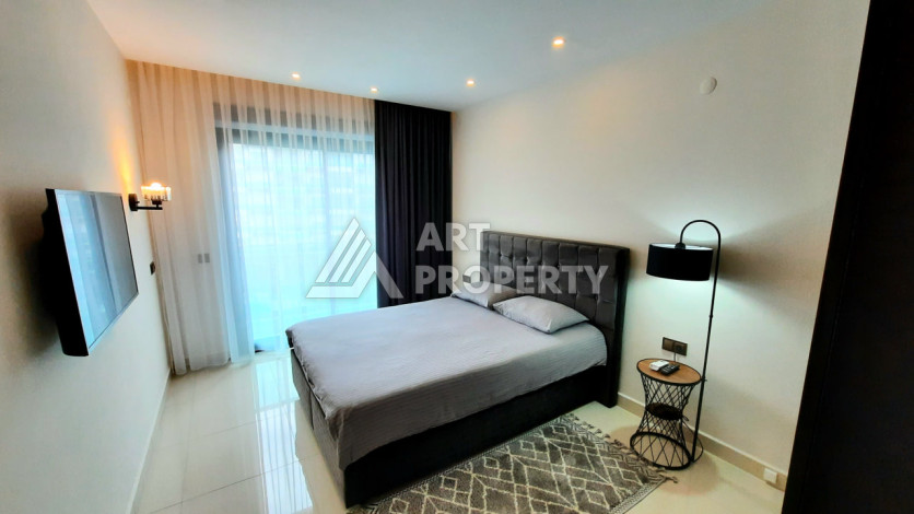 Меблированная квартира 1+1 от топового застройщика с полной инфраструктурой на берегу моря район Каргыджак - Ракурс 17