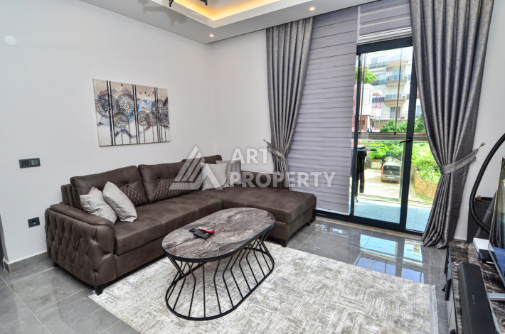 С мебелью и техникой квартира 1+1 в районе Оба - Ракурс 7