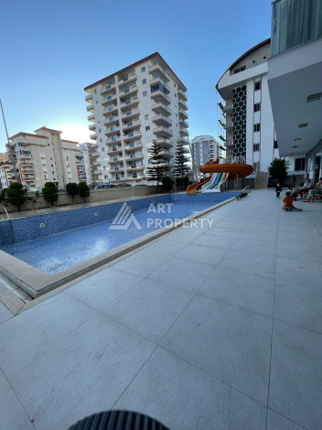 Квартира 1+1 общей площадью 75м2 в районе Махмутлар. - Ракурс 19