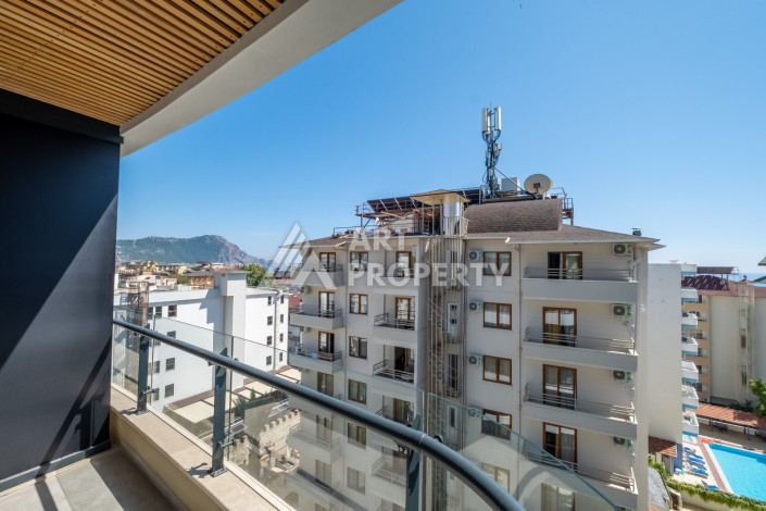 Стильные апартаменты 1+1 в районе пляжа Клеопатра центр Алании - Ракурс 19