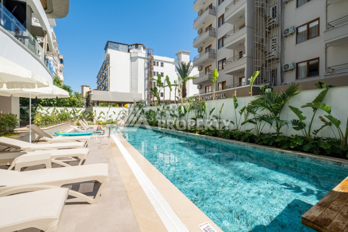 Стильные апартаменты 1+1 в районе пляжа Клеопатра центр Алании - Ракурс 25