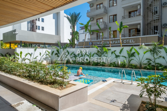 Стильные апартаменты 1+1 в районе пляжа Клеопатра центр Алании - Ракурс 26