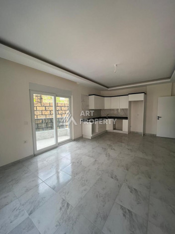 Новые апартаменты 2+1 в популярном районе Махмутлар - Ракурс 5