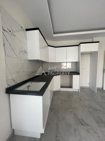 Новые апартаменты 2+1 в популярном районе Махмутлар - Ракурс 6